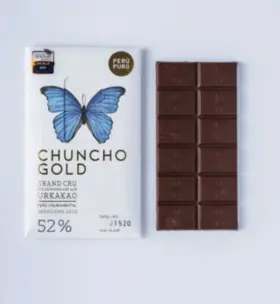 Produktverpackung mit Schmetterlingsgrafik und Schokoladnetafel Produktverpackung mit Schmetterlingsgrafik und Schokoladnetafel