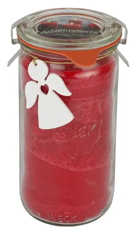 Große Adventskerze in rot im Glas mit einem dekorativem weißen Holzengel