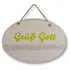 Weißes ovales Tonschild mit grüner Aufschrift "Grüß Gott" mit Ornamenten